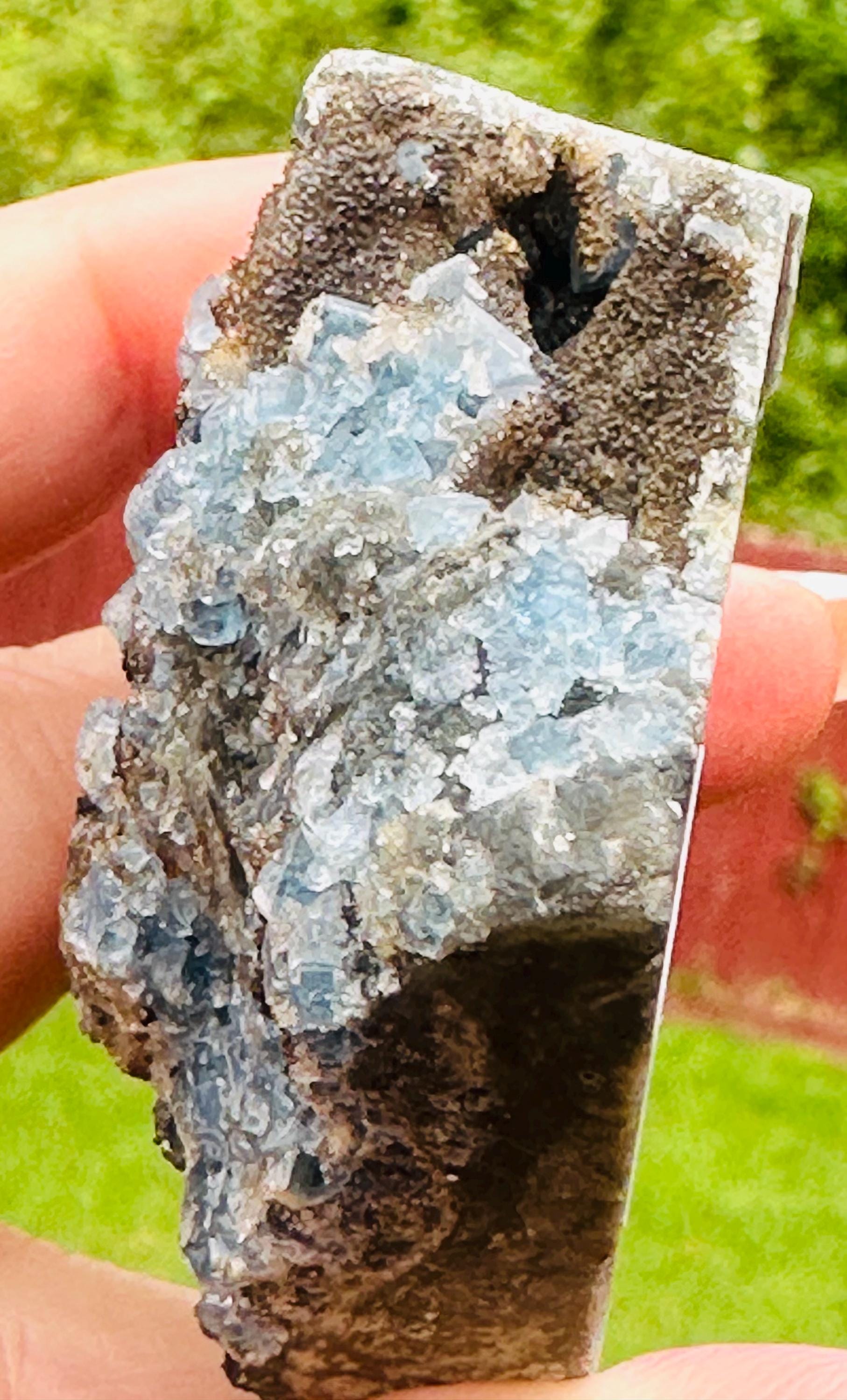 144 Grams Uncommon Self Standing Blue cubic Fluorite formed on a bed of Smokey Druzy Quartz