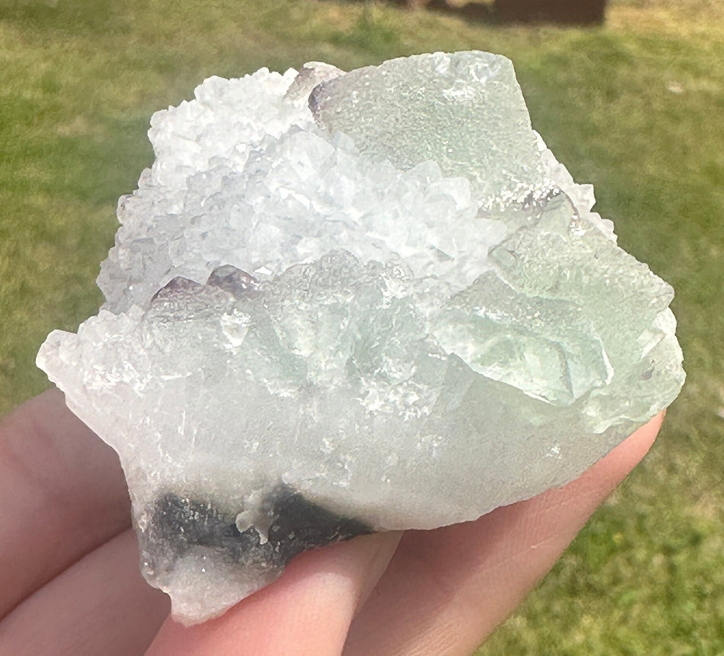 127 Grams Beautiful Light Green Octahedron with Purple Phantoms over White Quartz
