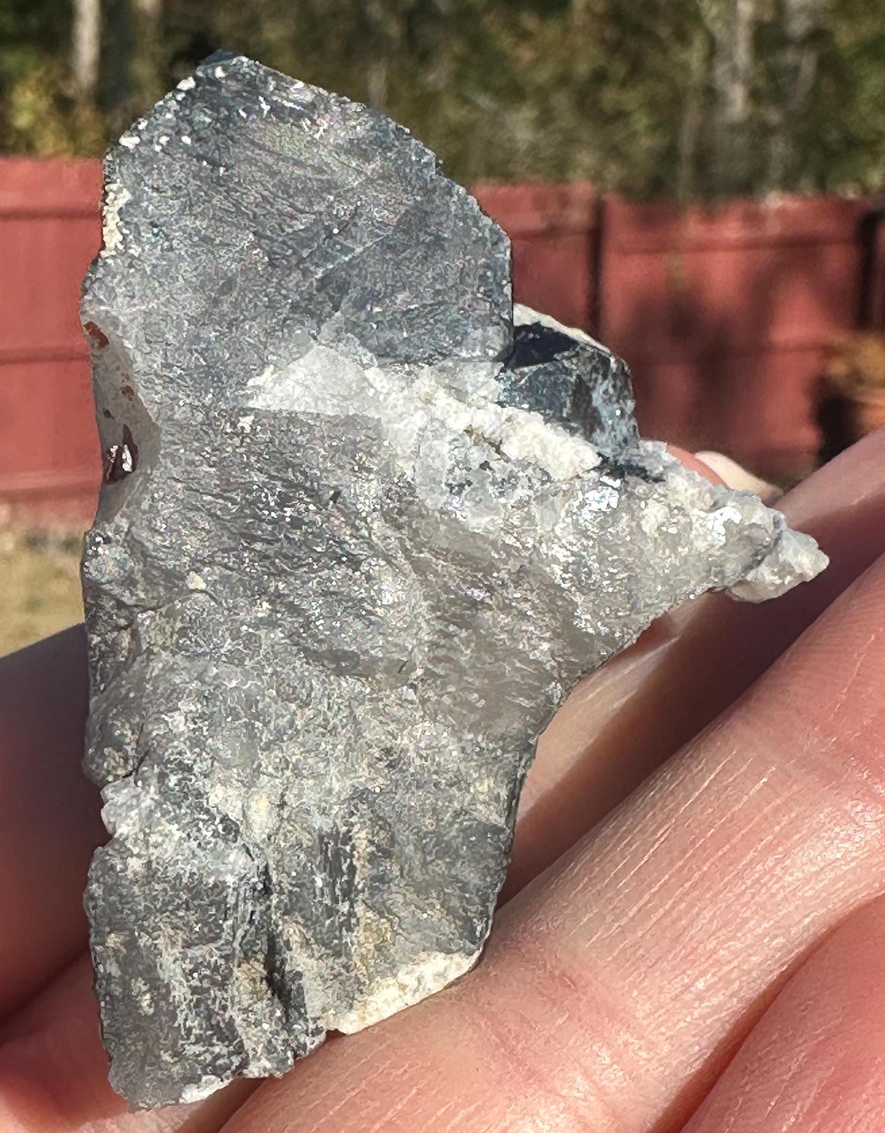 50 Grams of Blue / Black Riebeckite included Quartz From Pakistan