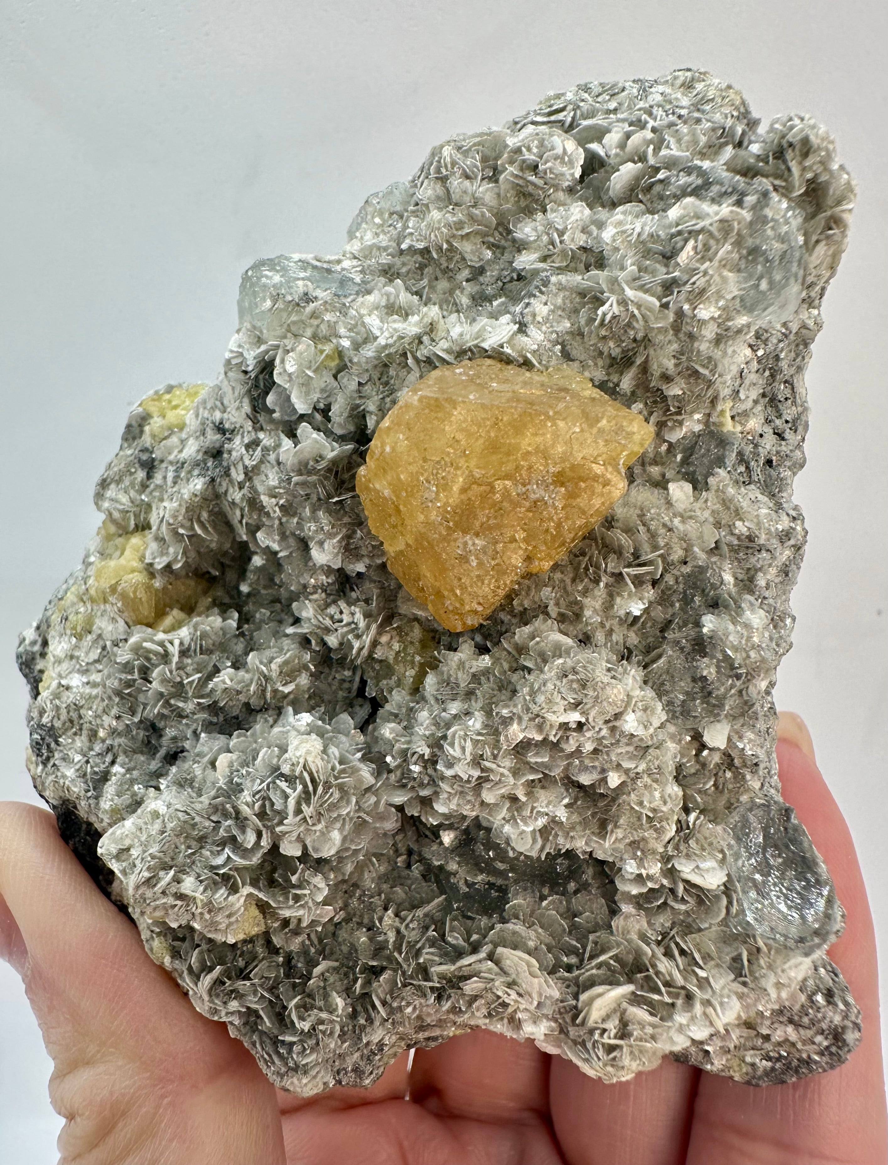 Clear Aquamarine, Golden Scheelite, and Silvery Muscovite from Mt. Xuebaoding, Pingwu County, Sichuan, China