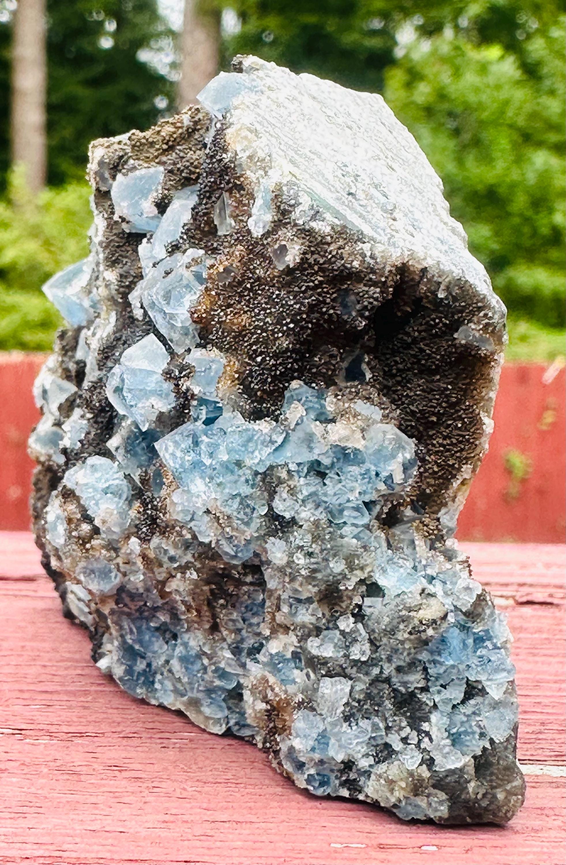 144 Grams Uncommon Self Standing Blue cubic Fluorite formed on a bed of Smokey Druzy Quartz