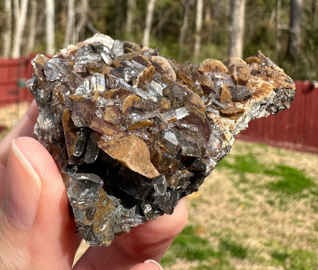 70 Grams Brown siderite with an uncommon needle tabby like quartz points formation