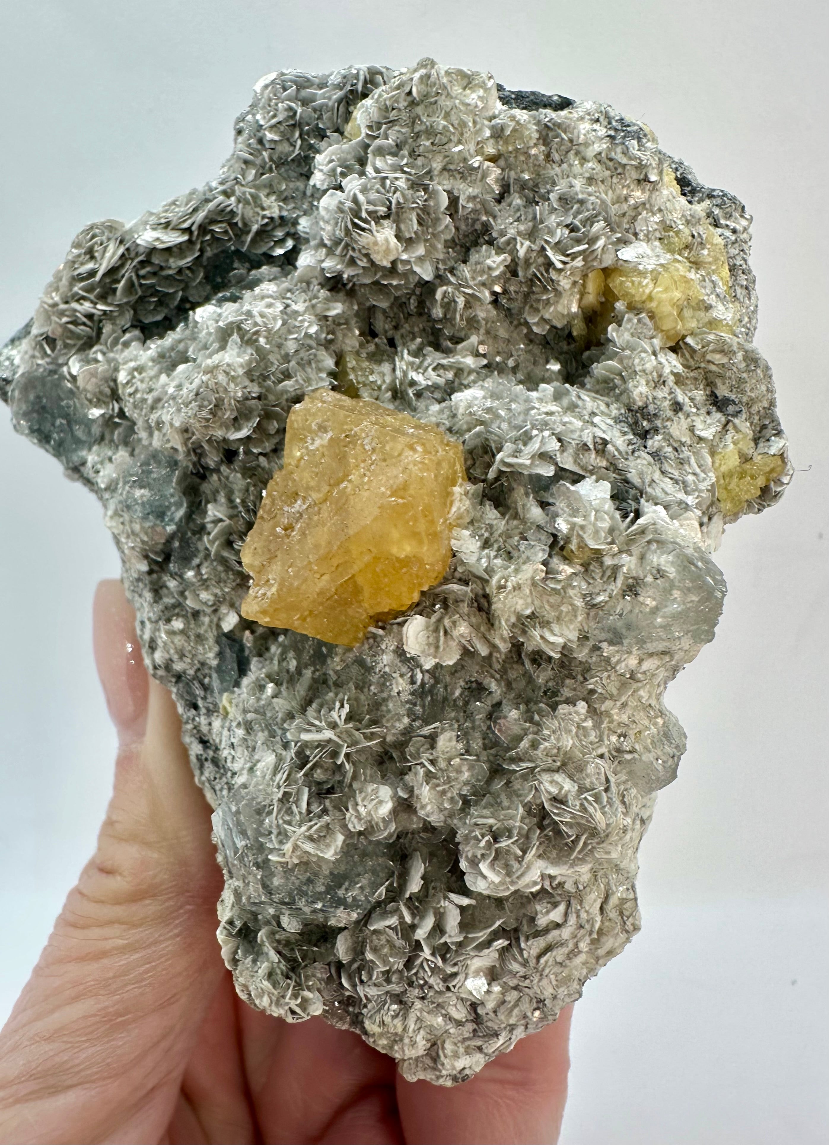 Clear Aquamarine, Golden Scheelite, and Silvery Muscovite from Mt. Xuebaoding, Pingwu County, Sichuan, China