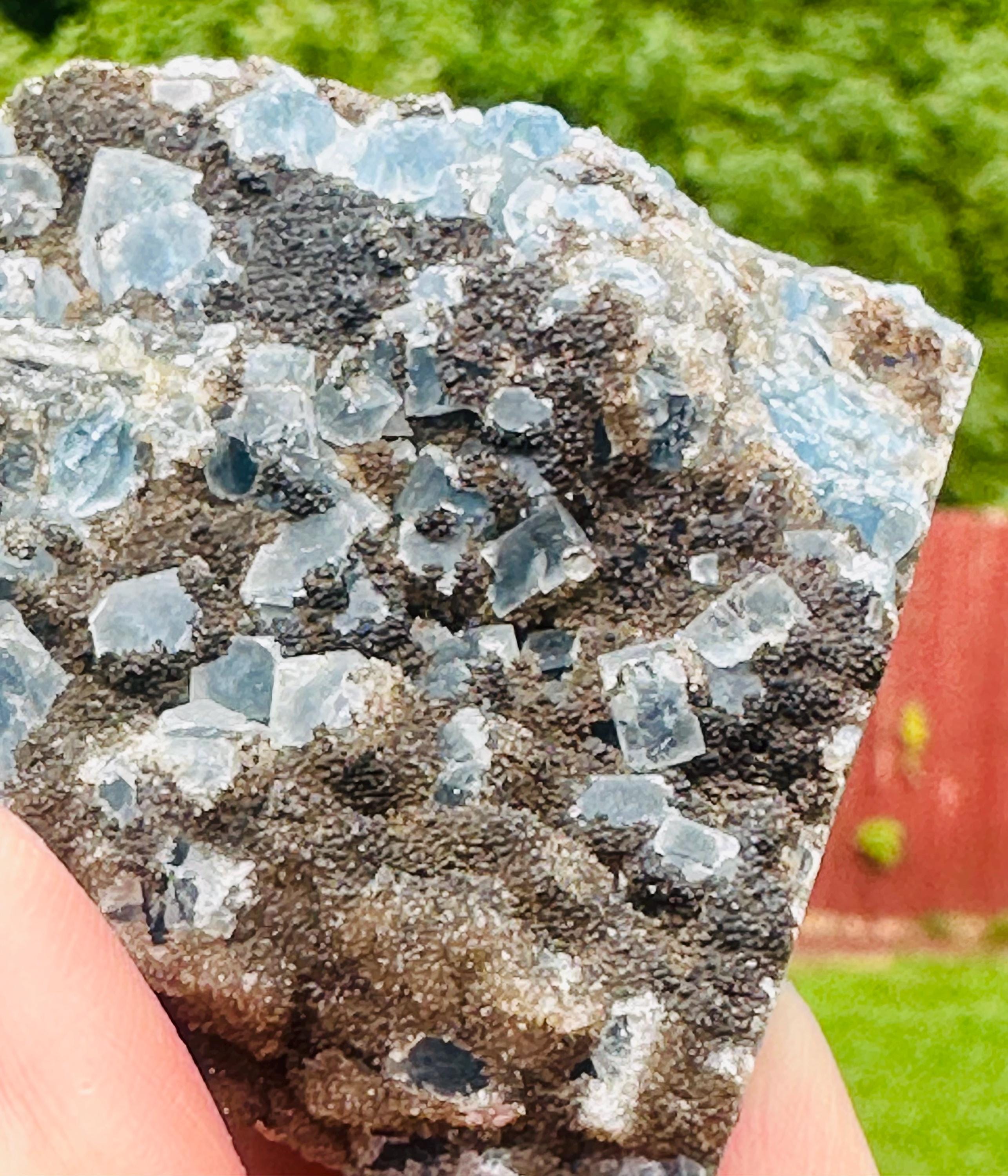 144 Grams Uncommon Self Standing Blue cubic Fluorite formed on a bed of Smokey Druzy Quartz
