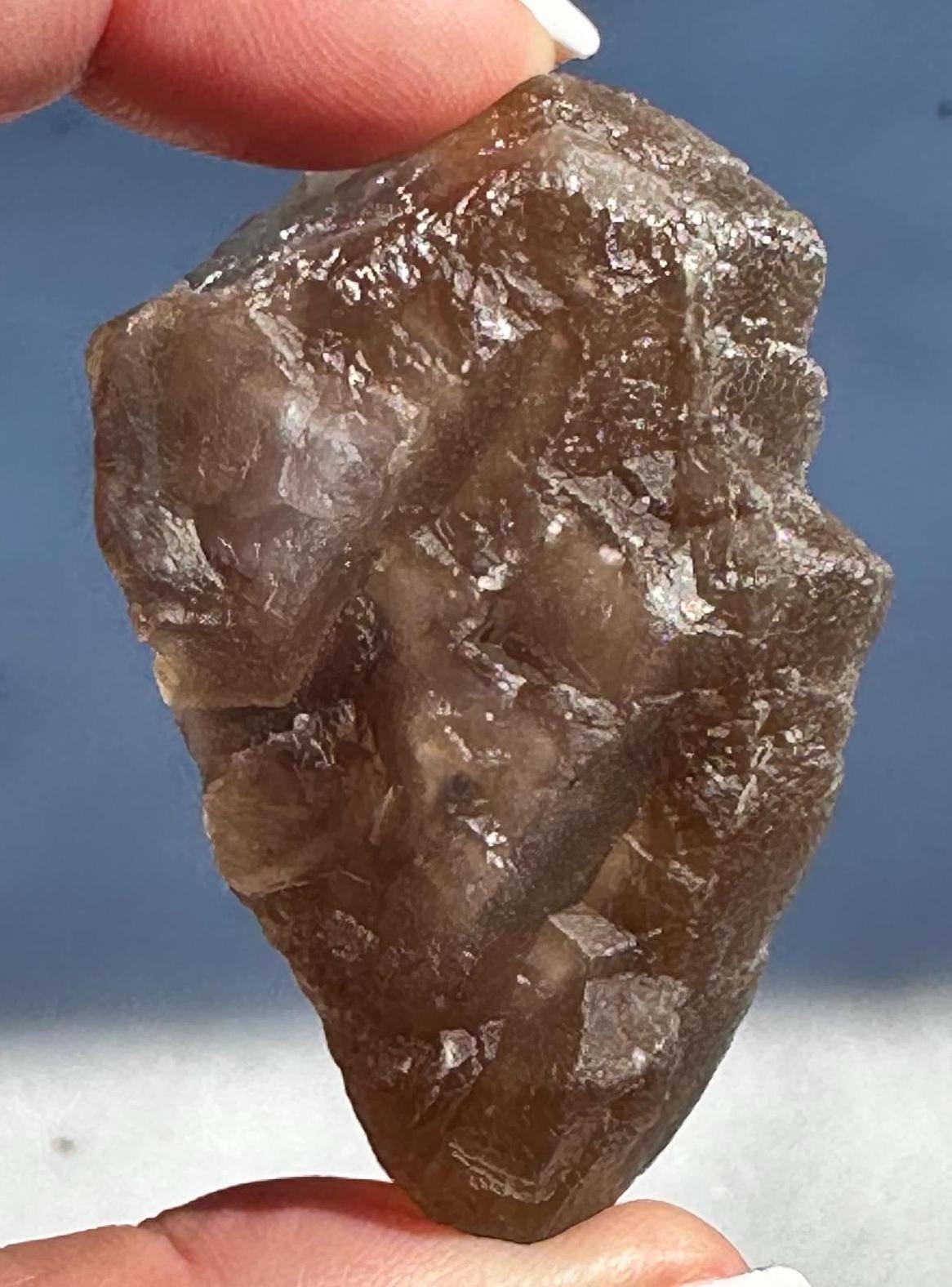 79 Grams Beautifu Natural Transparency Brownish Flourite with Baby Blue Phantom from China