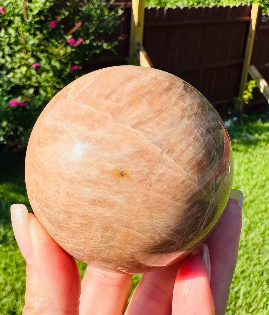 509 Grams of Harmonious Duo: Peach Moonstone Sphere & Flashing Palm Stone Set