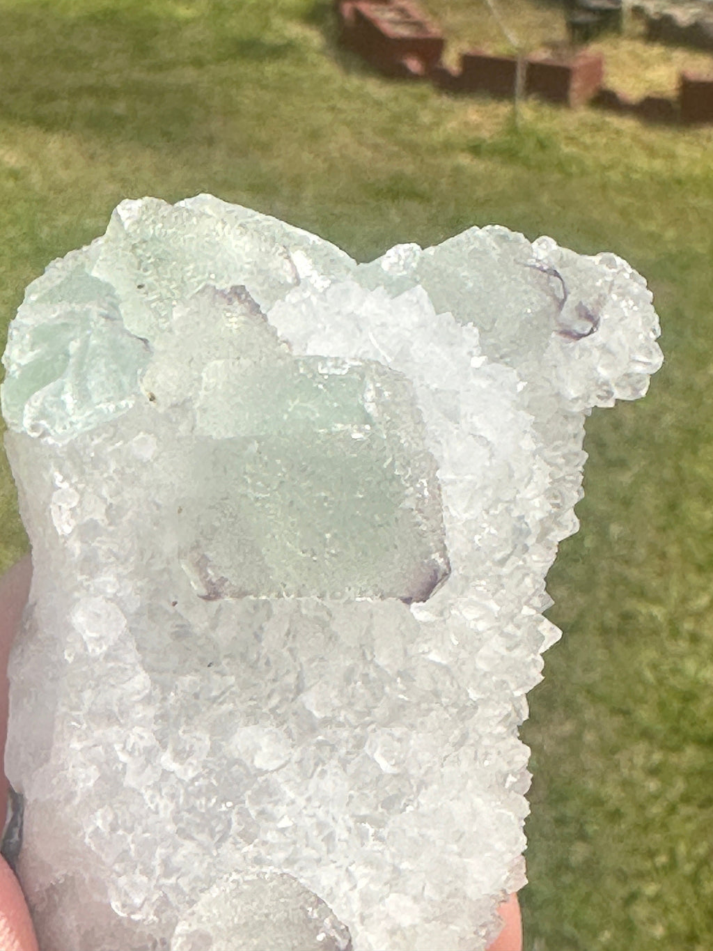 127 Grams Beautiful Light Green Octahedron with Purple Phantoms over White Quartz