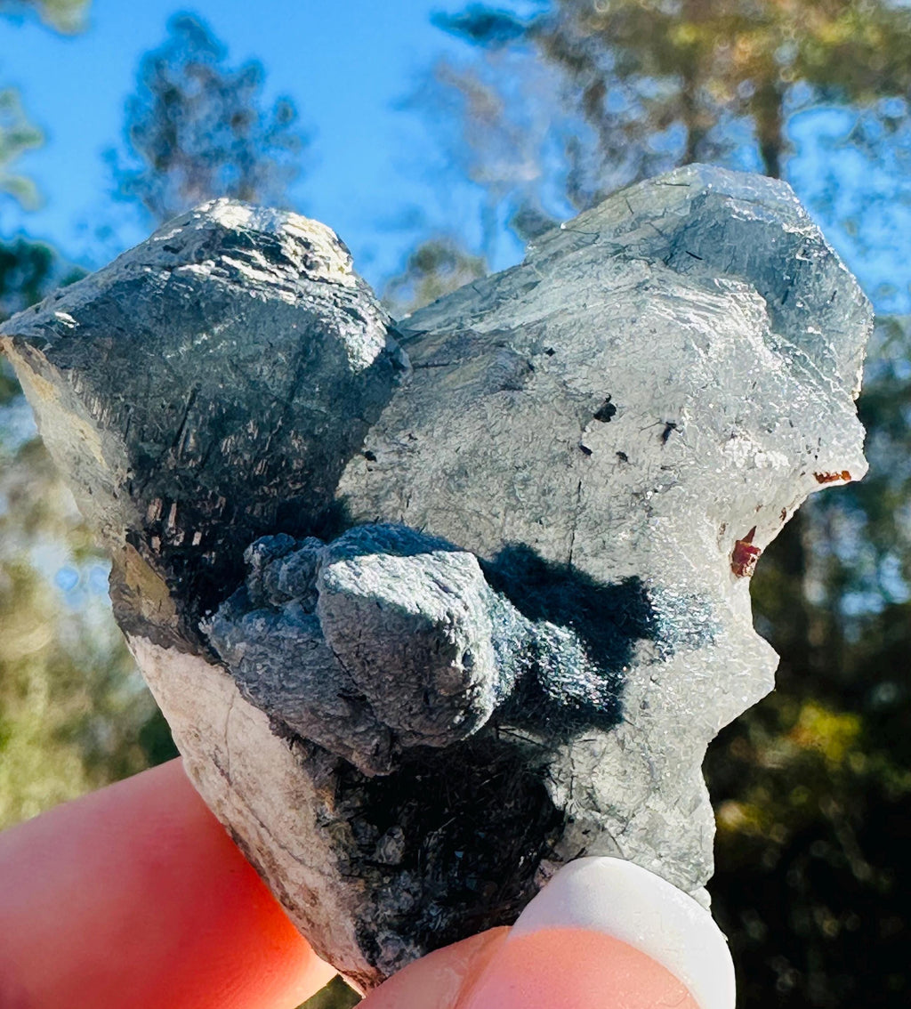 50 Grams of Blue / Black Riebeckite included Quartz From Pakistan