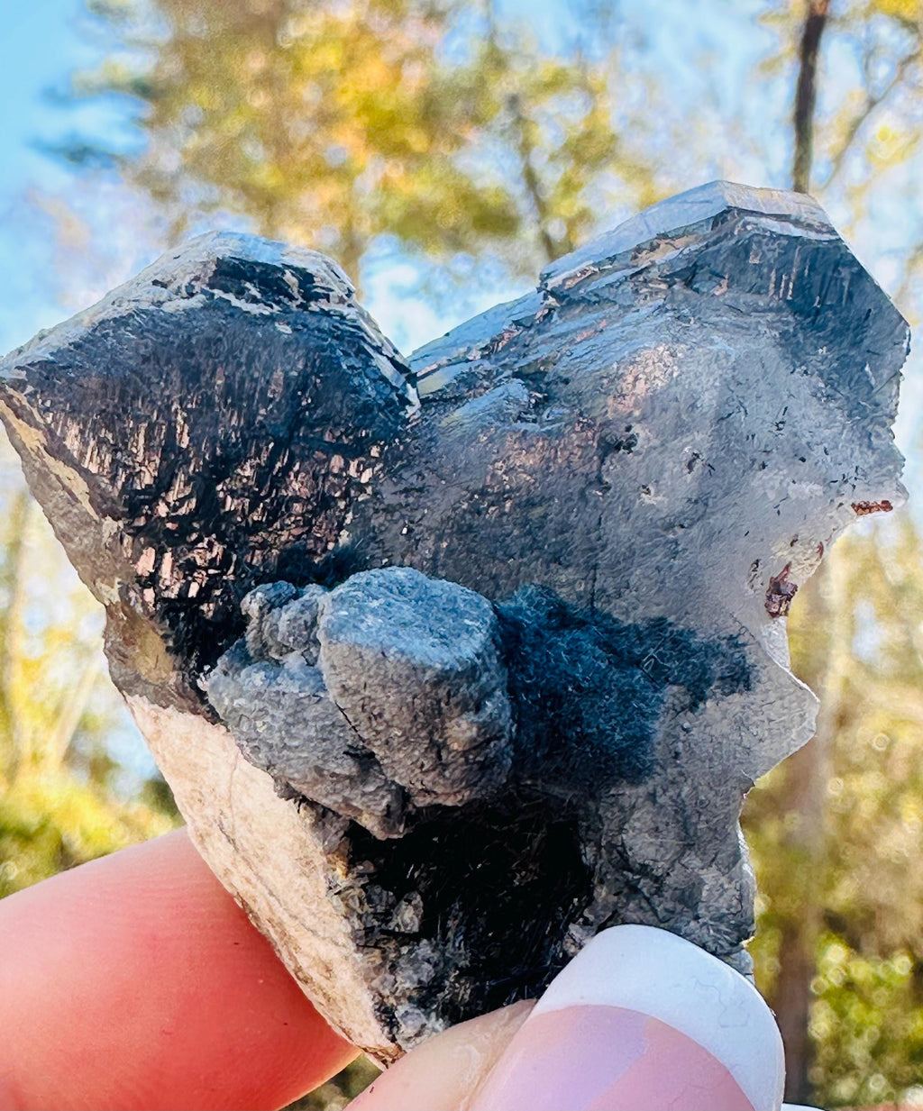 50 Grams of Blue / Black Riebeckite included Quartz From Pakistan