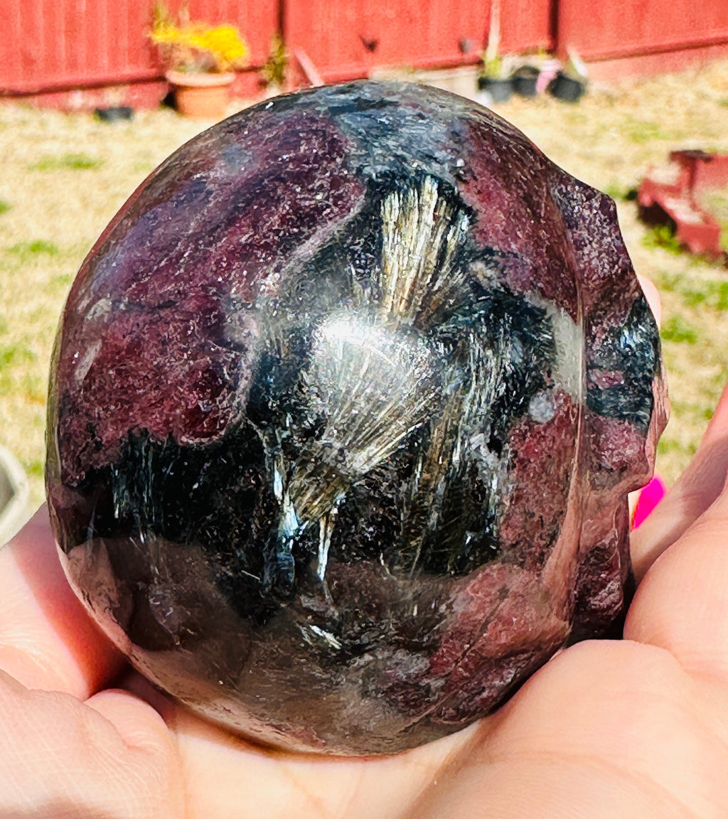 450 Grams Power House of Garnet in Arfvedsonite Skull Carving